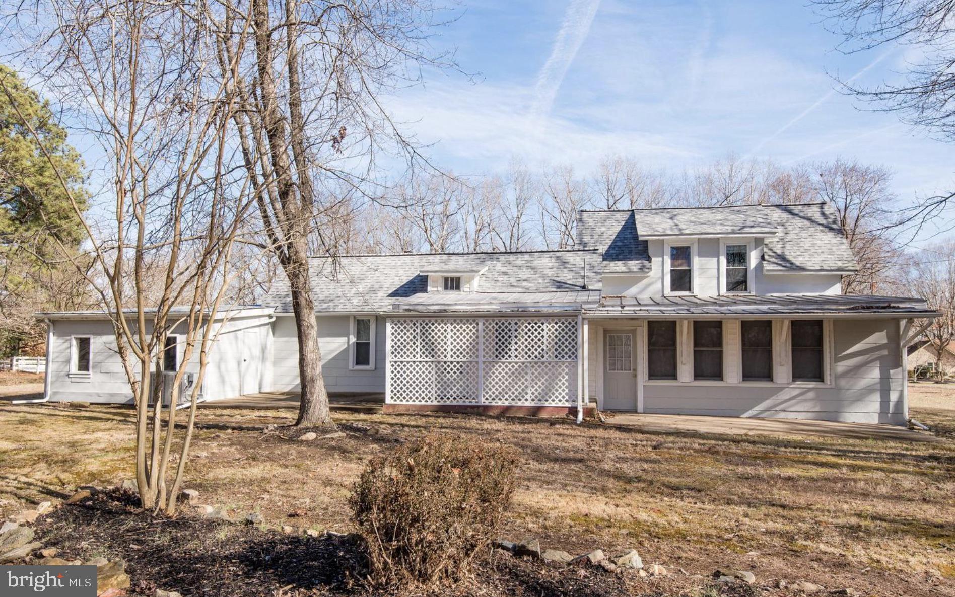126 Ramoth Church Road Stafford, VA 22554 - Photo 17 of 17 a view of a white house with a yard covered with snow