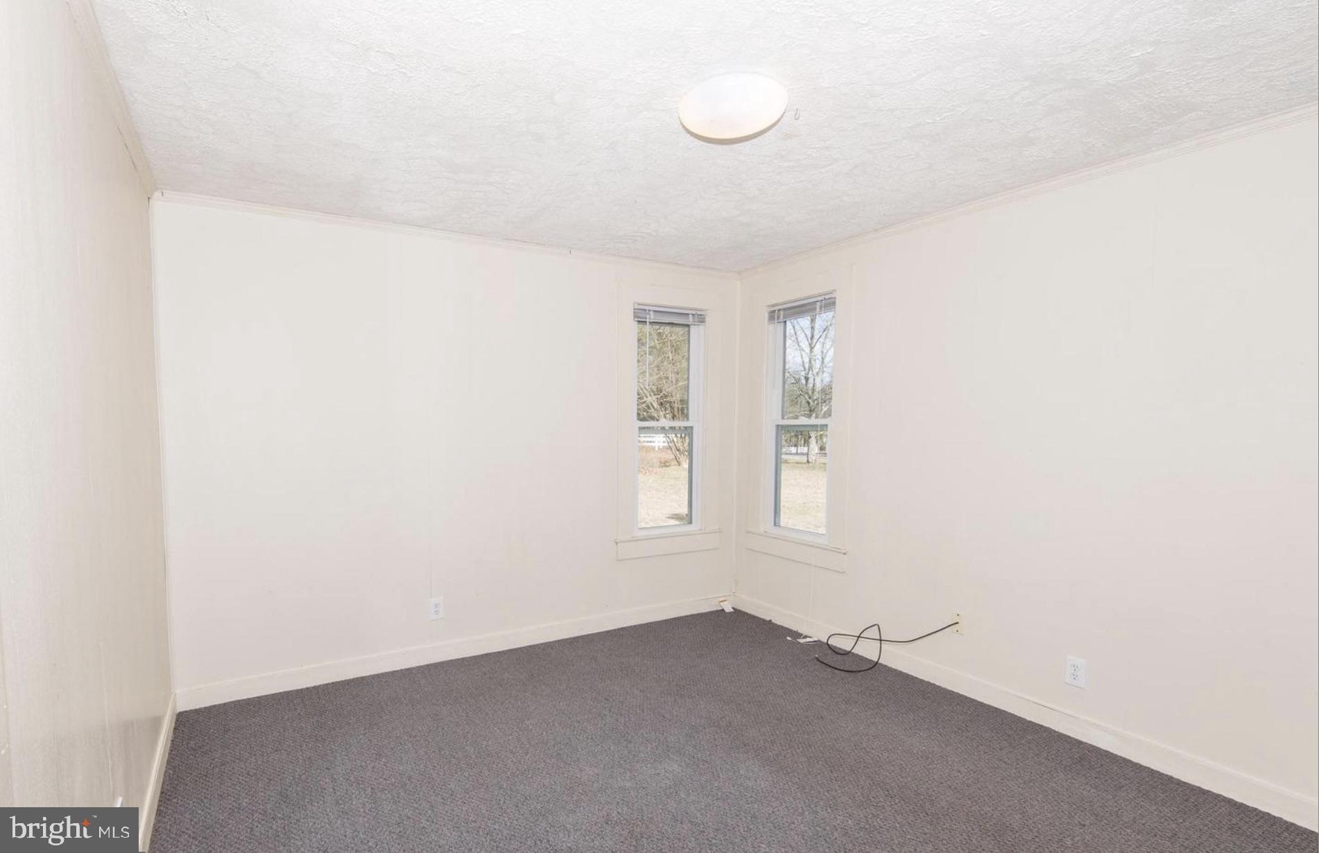 126 Ramoth Church Road Stafford, VA 22554 - Photo 10 of 17 an empty room with windows