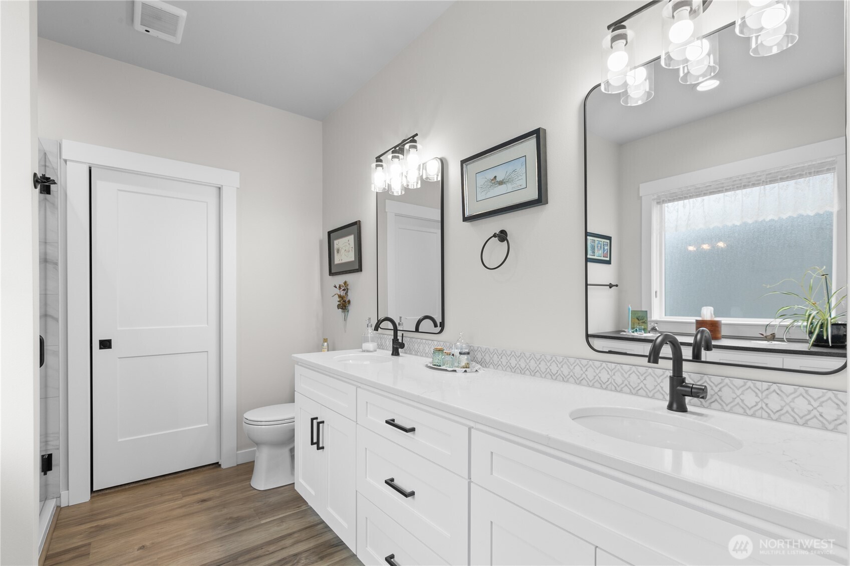 2068 Bowfin Way Lynden, WA 98264 - Photo 14 of 35 a bathroom with a double vanity sink and a mirror