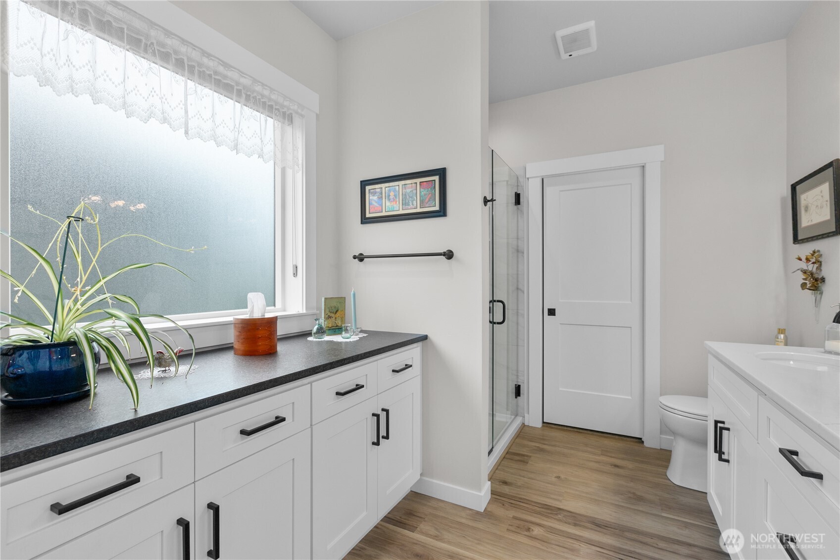 2068 Bowfin Way Lynden, WA 98264 - Photo 15 of 35 a spacious bathroom with double vanity and a mirror