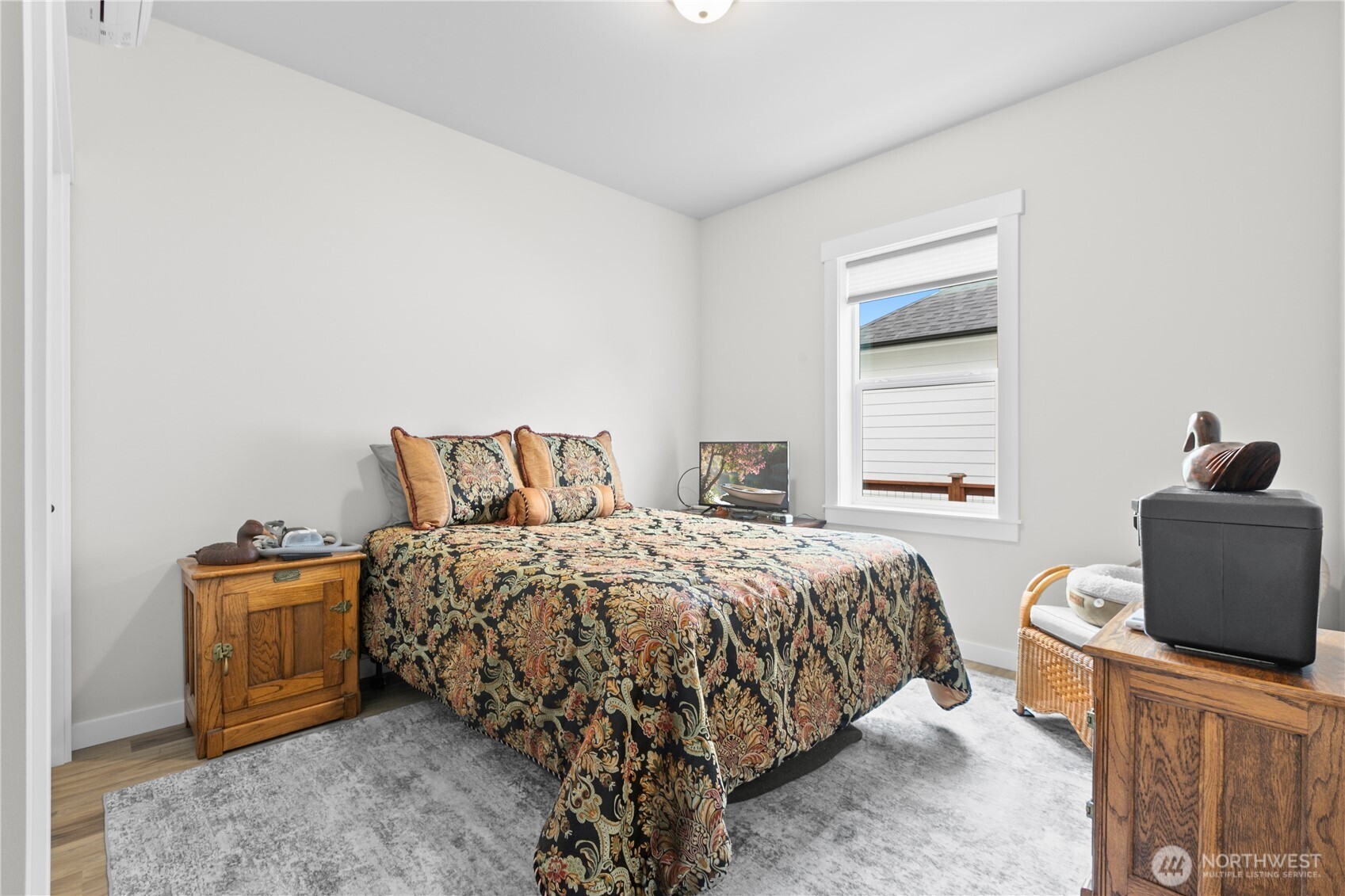 2068 Bowfin Way Lynden, WA 98264 - Photo 17 of 35 a bedroom with a bed and a window