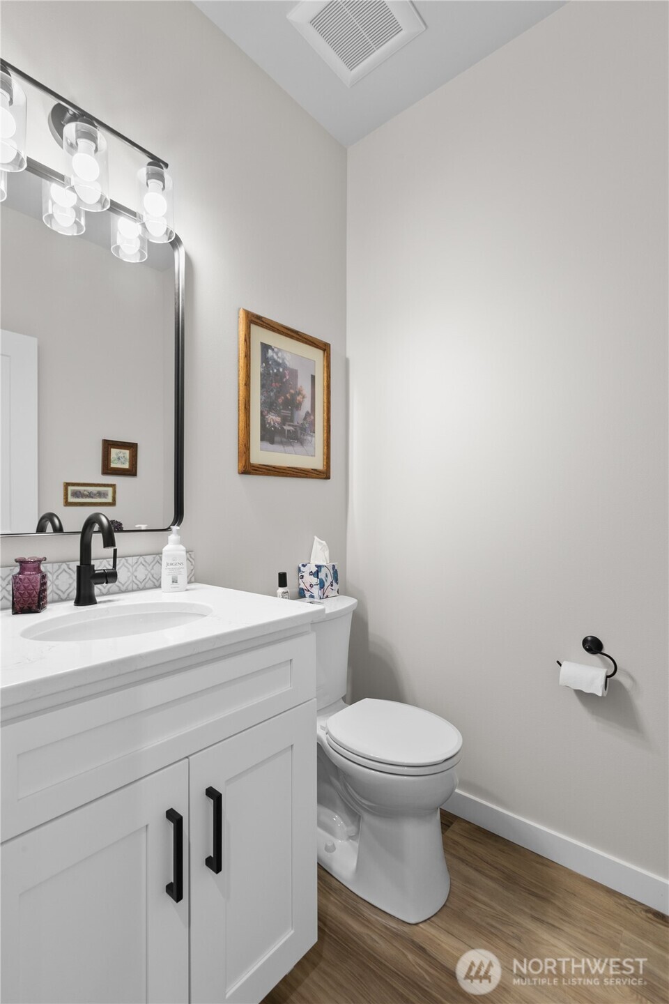 2068 Bowfin Way Lynden, WA 98264 - Photo 20 of 35 a bathroom with a sink a toilet and mirror