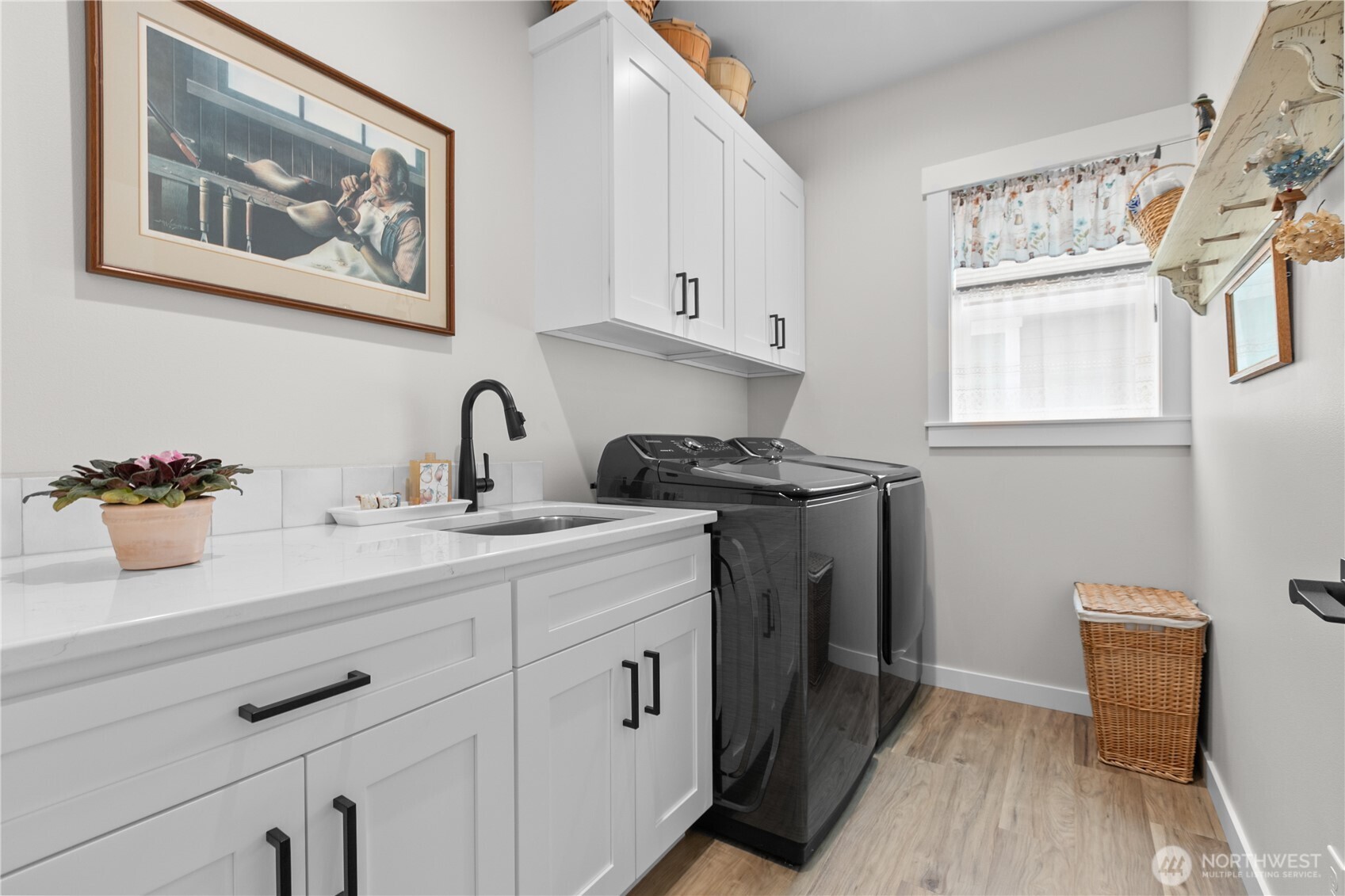 2068 Bowfin Way Lynden, WA 98264 - Photo 21 of 35 a kitchen with a sink and cabinets