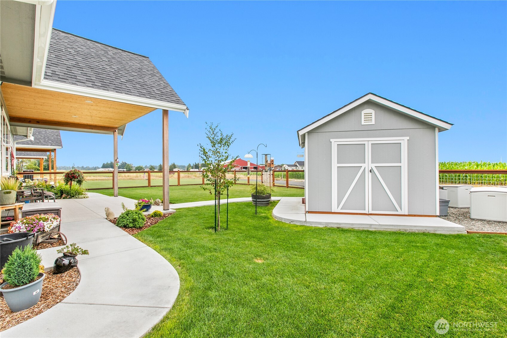 2068 Bowfin Way Lynden, WA 98264 - Photo 22 of 35 a view of a house with a yard and a patio