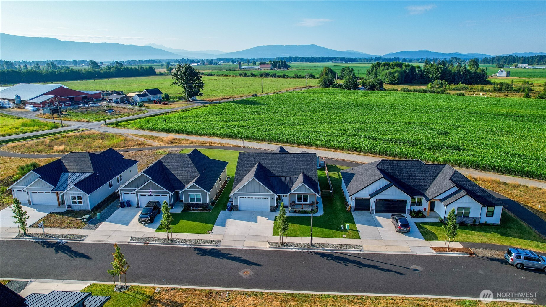 2068 Bowfin Way Lynden, WA 98264 - Photo 32 of 35 an aerial view of a house with garden space and street view