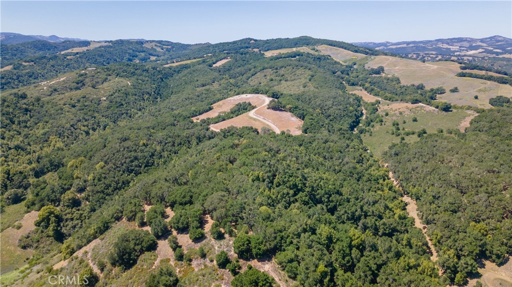 0 York Mountain Road Templeton, CA 93465 - Photo 5 of 41 an aerial view of a house with a lush green hillside