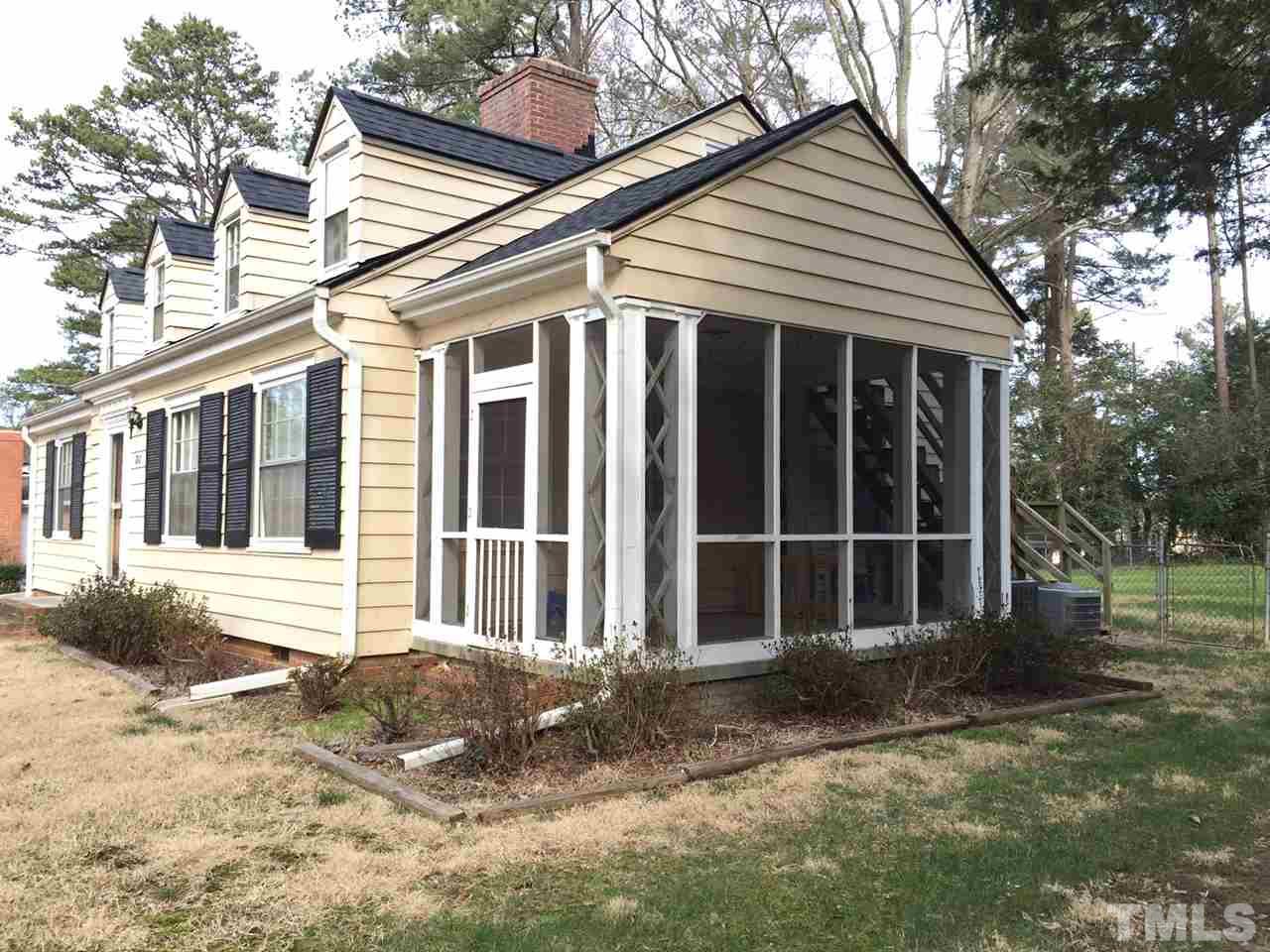 810 Chamberlain Street Raleigh, NC 27607 - Photo 16 of 16 a view of a house with a yard