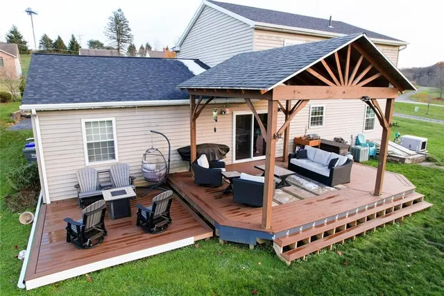 a living room with furniture window and wooden floor