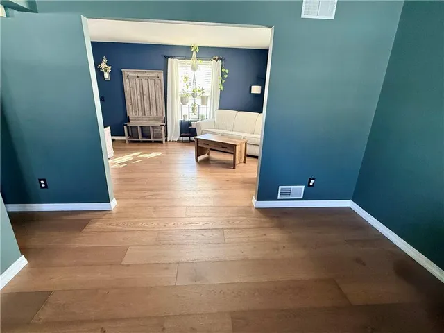 a living room with furniture and a couch