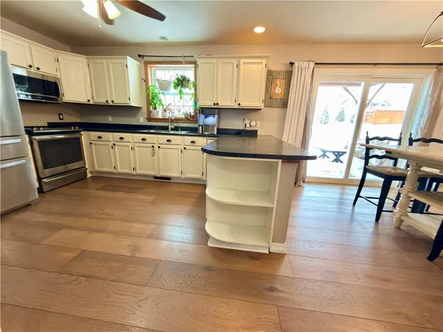 a room with gym equipment and a table