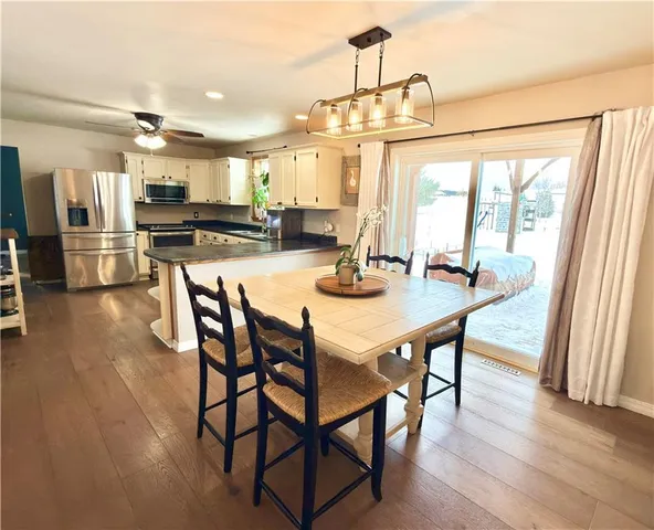 a bedroom with a bed and furniture