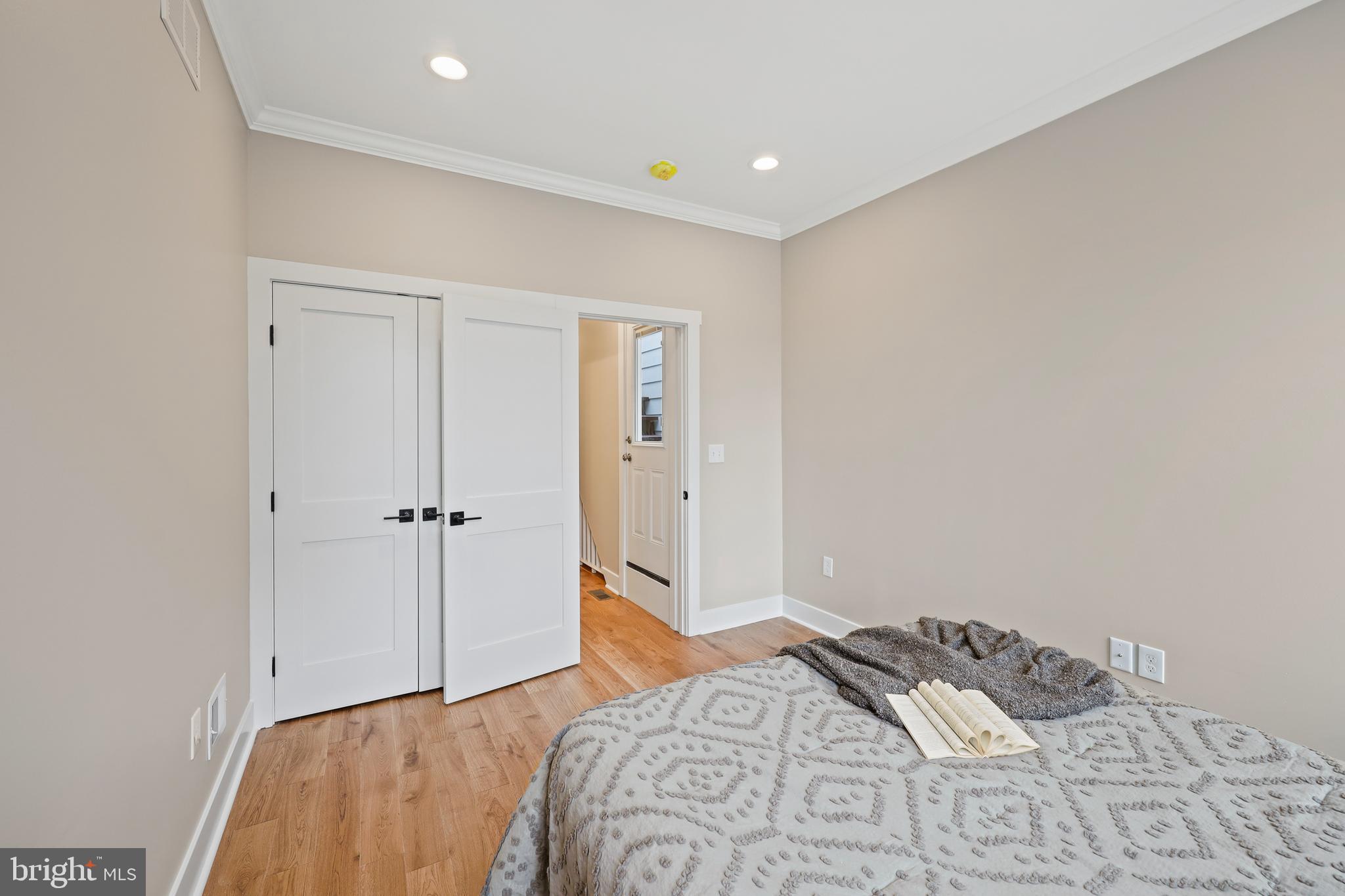 1465 Towson Street Baltimore, MD 21230 - Photo 22 of 39 a bedroom with a bed and a closet