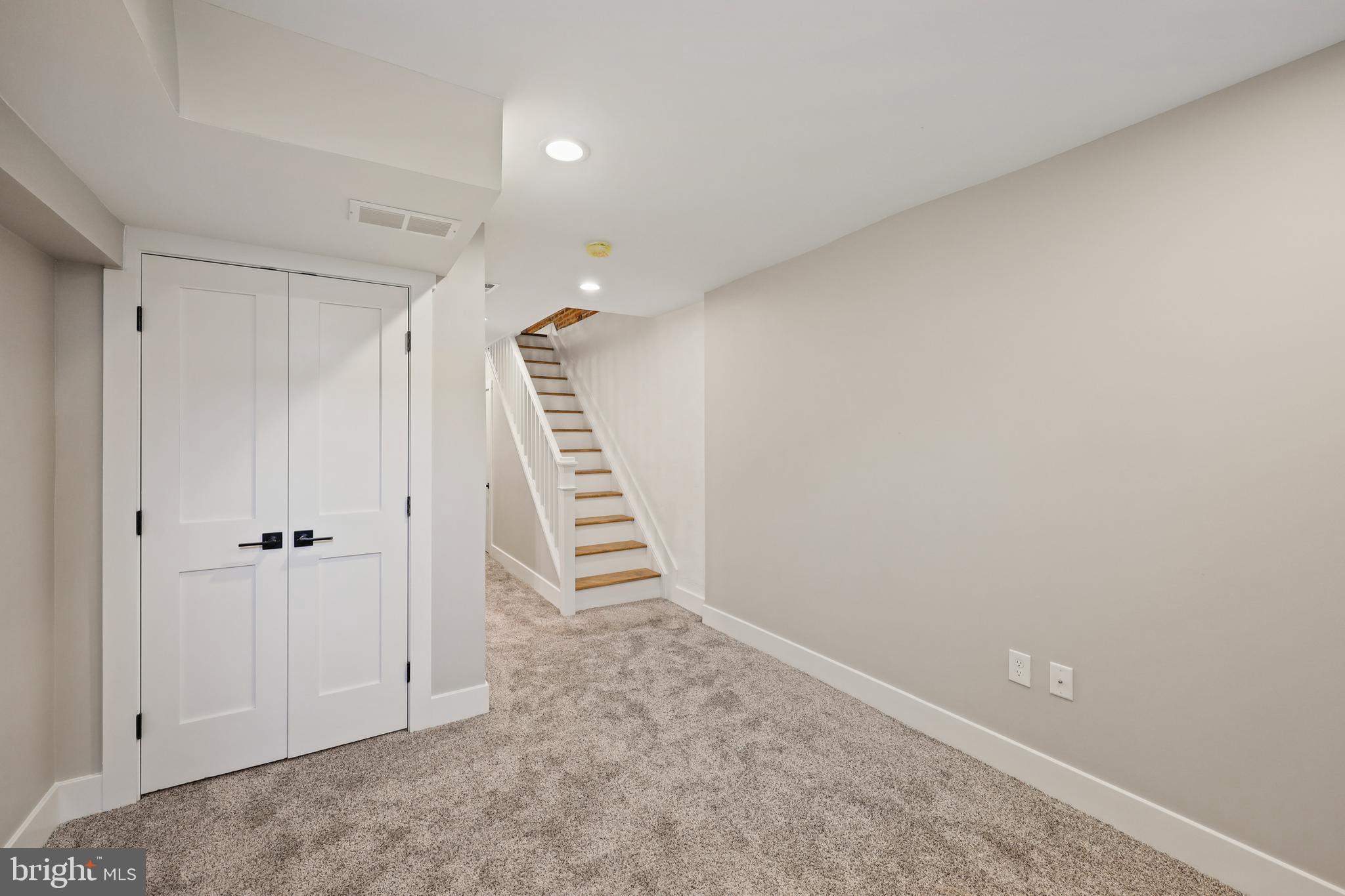 1465 Towson Street Baltimore, MD 21230 - Photo 30 of 39 a view of room with stairs