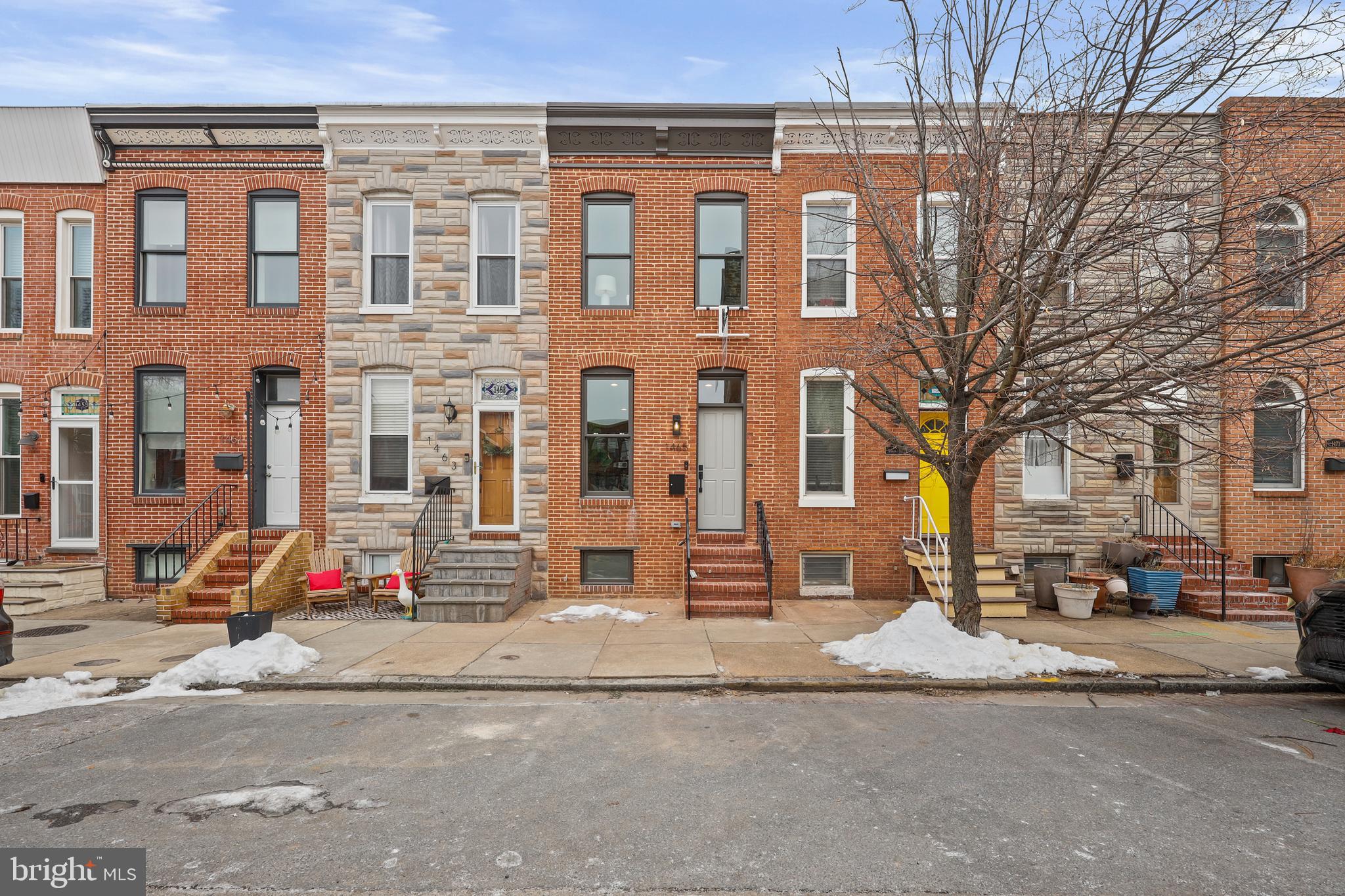 1465 Towson Street Baltimore, MD 21230 - Photo 34 of 39 a front view of a building with street view