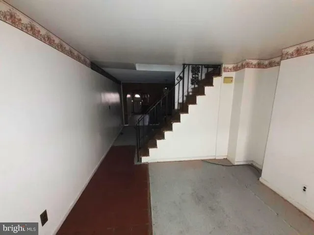 a view of entryway with stairs