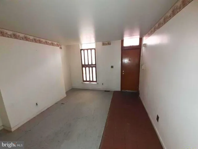 a view of a hallway with windows