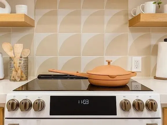 a bed room with a bed and potted plants