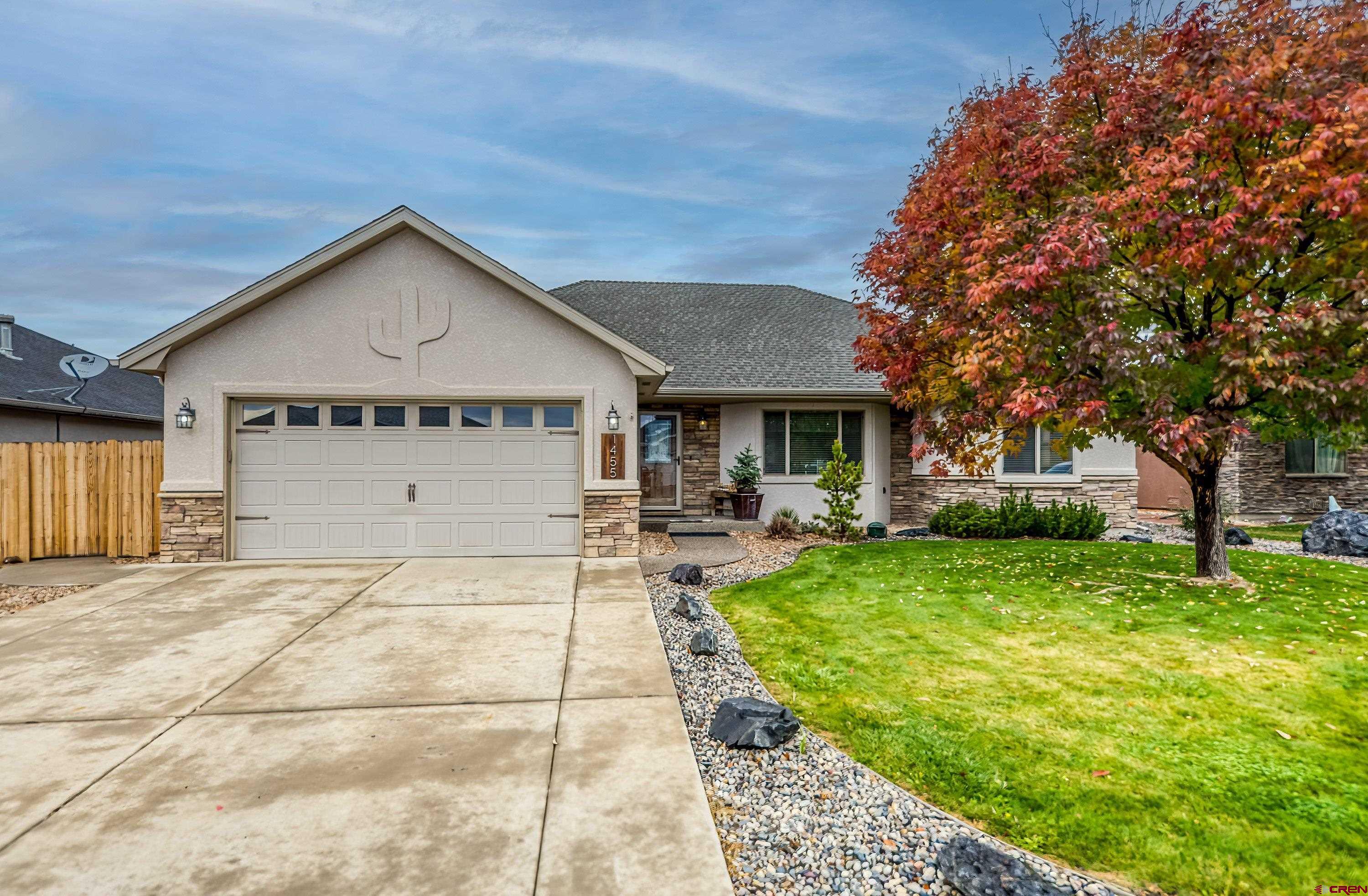 1455 Criterion Street Delta, CO 81416 - Photo 21 of 27 a front view of a house with garden