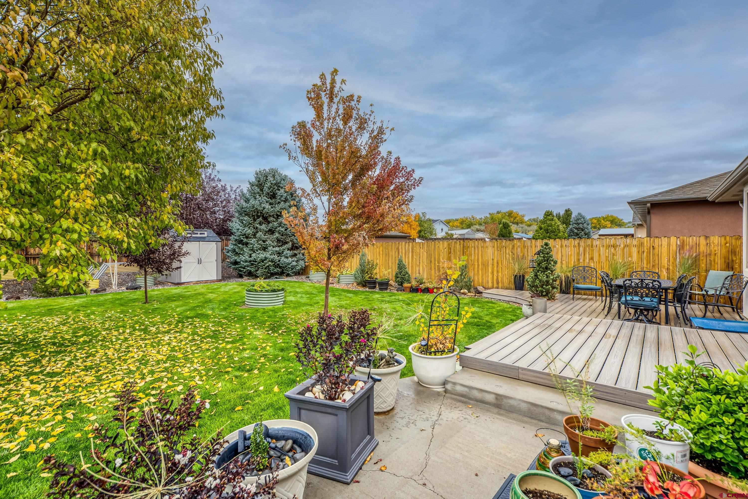 1455 Criterion Street Delta, CO 81416 - Photo 25 of 27 a view of a backyard with sitting area