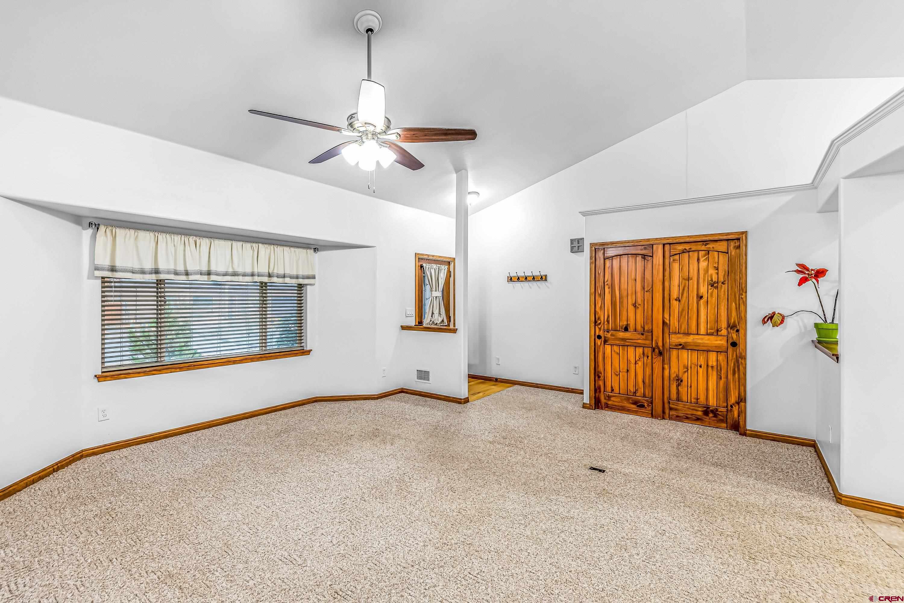 1455 Criterion Street Delta, CO 81416 - Photo 4 of 27 a view of an empty room with a window