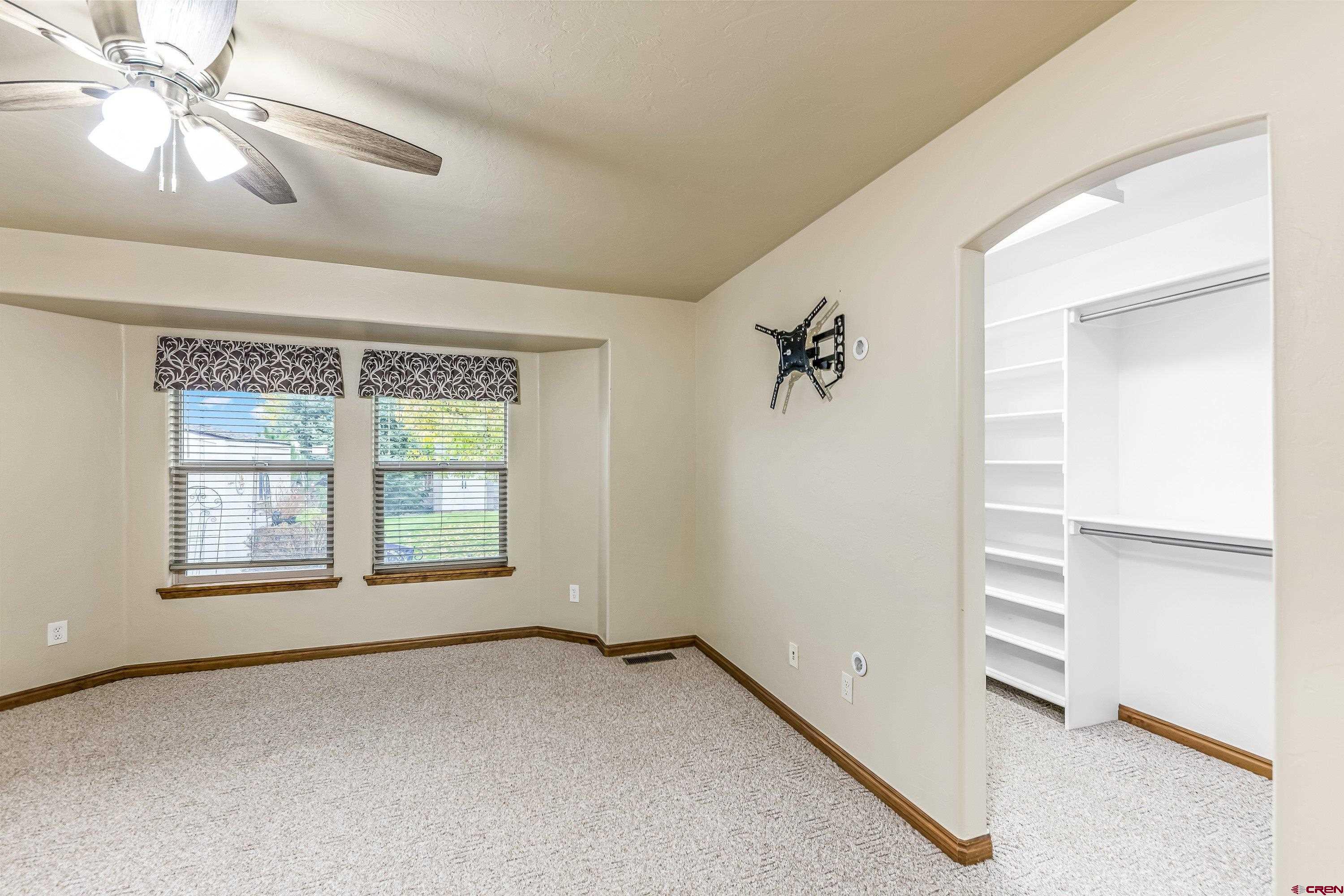 1455 Criterion Street Delta, CO 81416 - Photo 10 of 27 a view of an empty room with a window