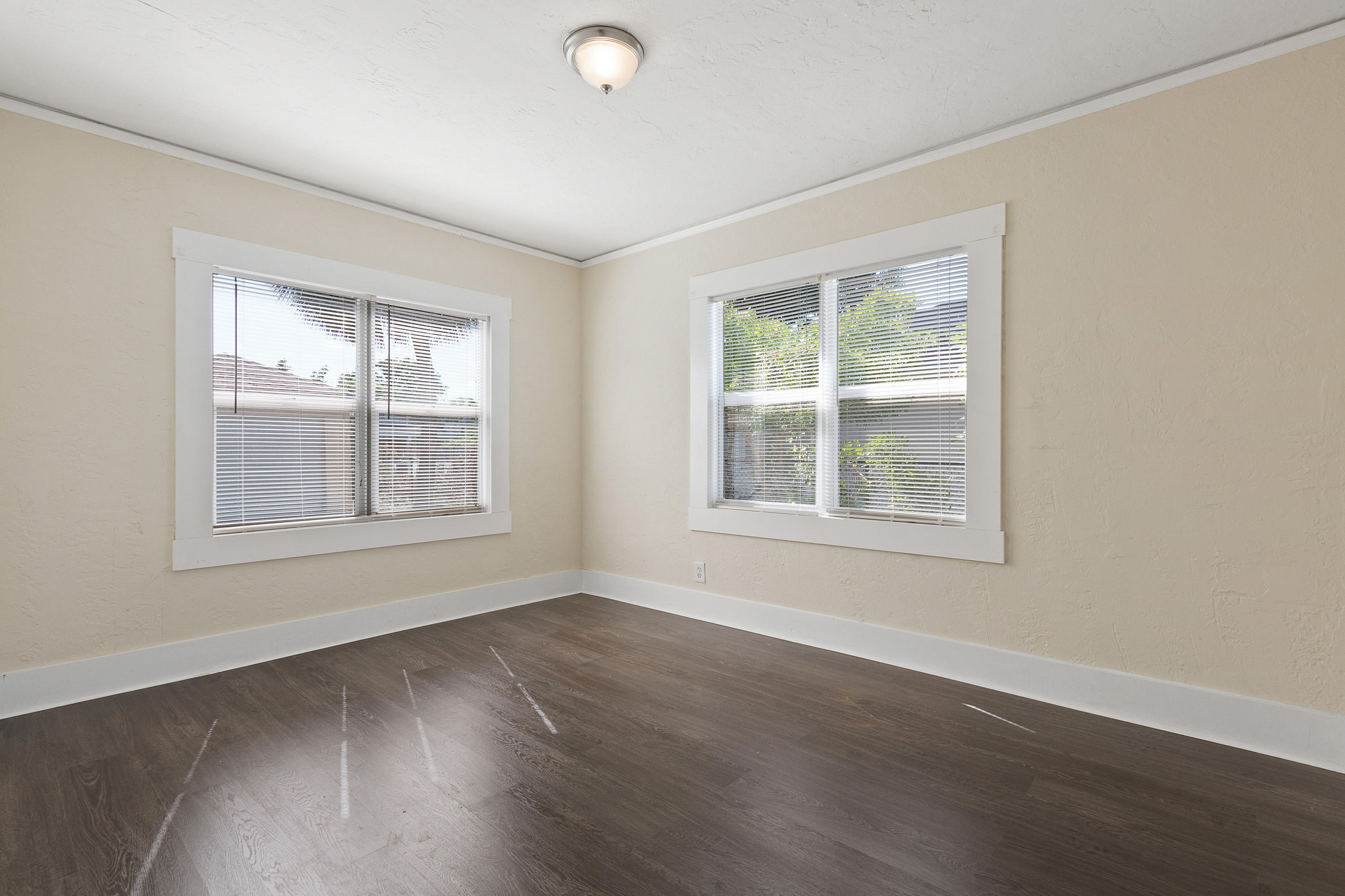 534 Hampton Road West Palm Beach, FL 33405 - Photo 14 of 29 an empty room with wooden floor and windows