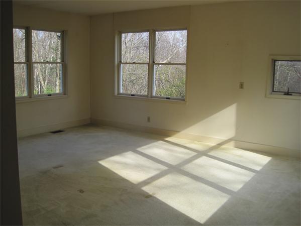 1018 Liberty Square Road Boxborough, MA 01719 - Photo 18 of 22 a view of an empty room with a window