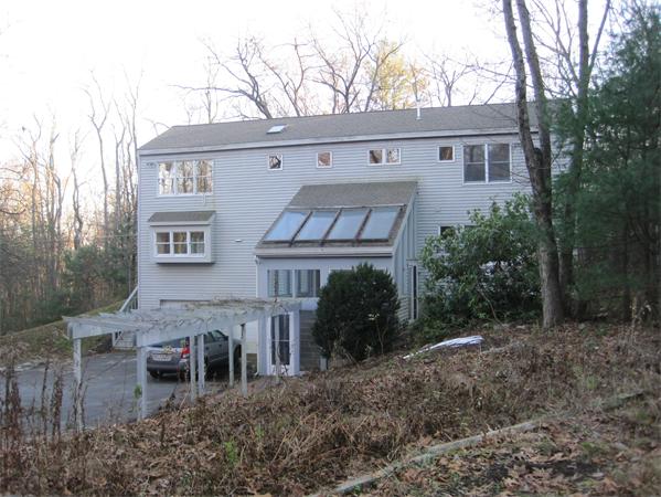 1018 Liberty Square Road Boxborough, MA 01719 - Photo 2 of 22 a view of a house with backyard and sitting area