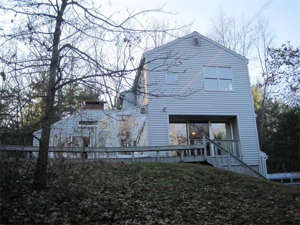 1018 Liberty Square Road Boxborough, MA 01719 - Photo 4 of 22 a backyard of a house with lots of green space