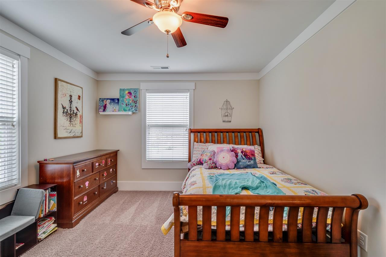 1309 Kintail Drive Raleigh, NC 27613 - Photo 21 of 30 Another spacious secondary bedroom with great closet space and a shared bathroom. Secondary Bedroom