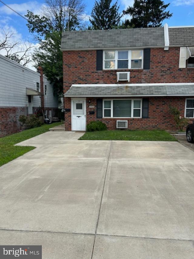 10120 Verree Road Philadelphia, PA 19116 - Photo 1 of 17 a front view of a house with a yard and garage