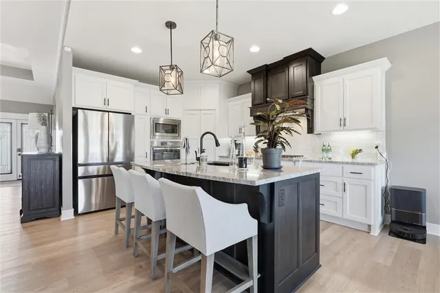 $715,000 | 1203 Serenity Court, Raymore, MO 64083