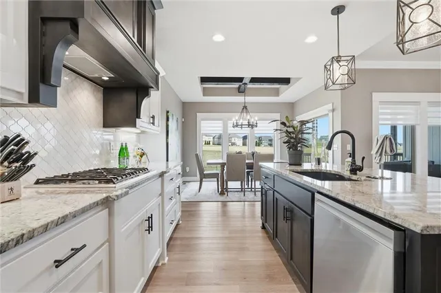 $715,000 | 1203 Serenity Court, Raymore, MO 64083