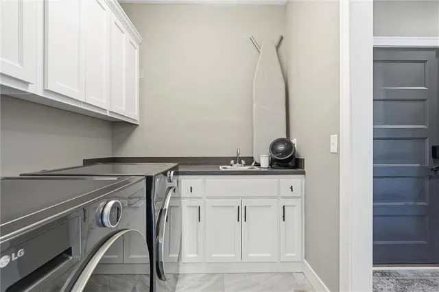 $715,000 | 1203 Serenity Court, Raymore, MO 64083