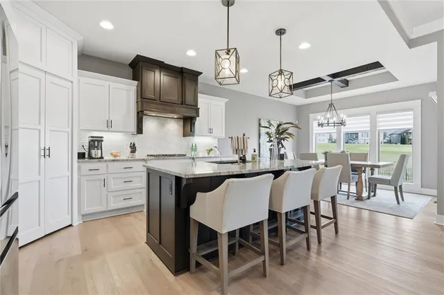 $715,000 | 1203 Serenity Court, Raymore, MO 64083