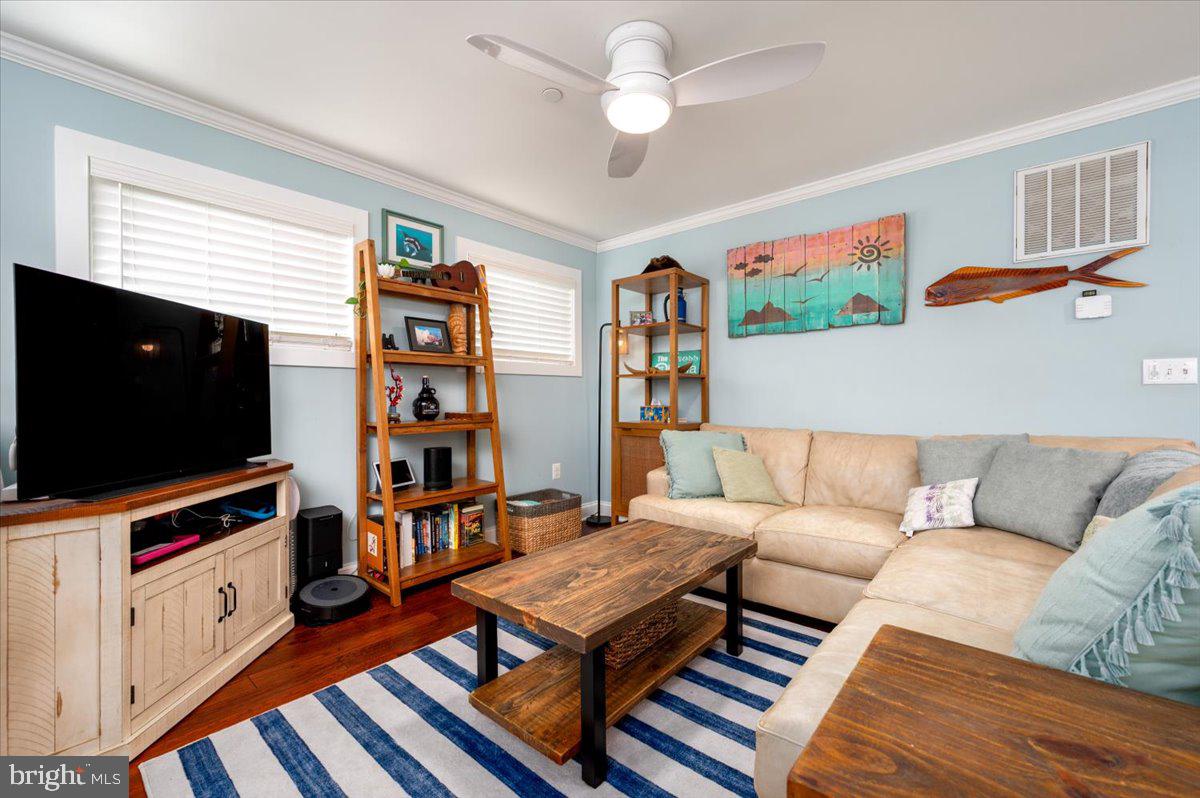 57 Spa Road Annapolis, MD 21401 - Photo 6 of 39 a living room with furniture and a flat screen tv