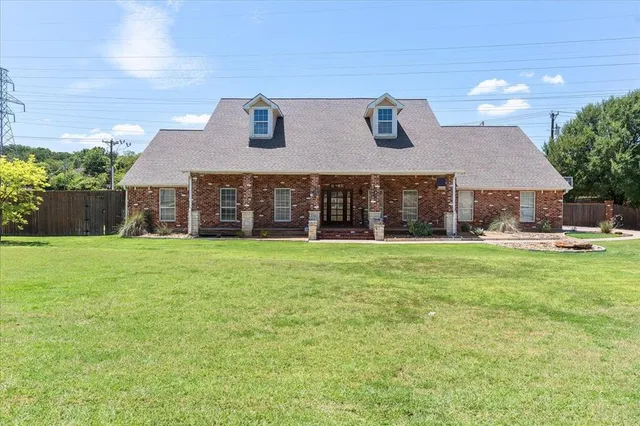 a front view of house with yard