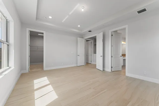 a view of a playground with a house