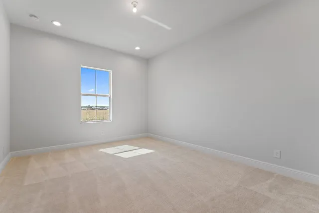 a room with furniture and wooden floor