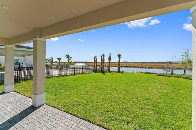 a view of a lake and a yard