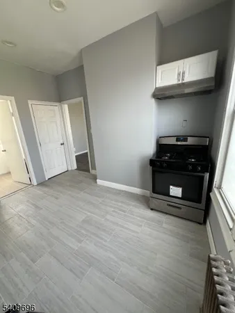 a view of kitchen and microwave
