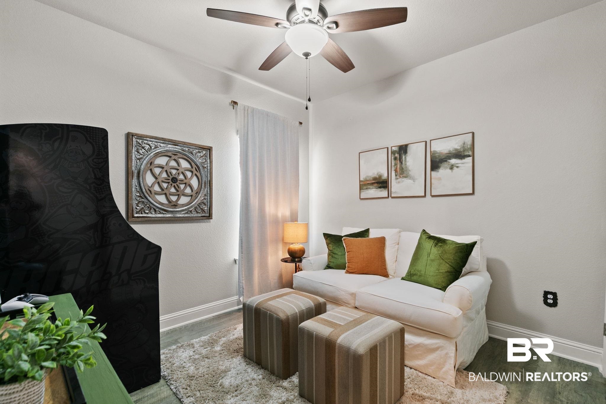 31650 Memphis Loop Daphne, AL 36527 - Photo 32 of 68 Living room with a ceiling fan and wood finished floors