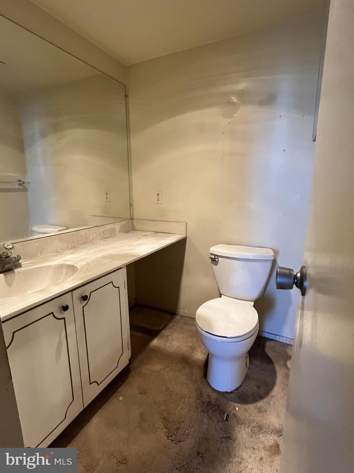 300 M Street Southwest, Unit N801 Washington, DC 20024 - Photo 11 of 12 a bathroom with a granite countertop toilet and a sink