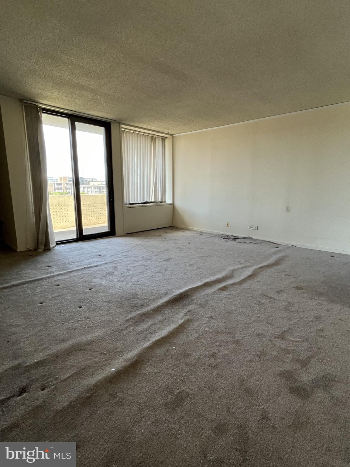 300 M Street Southwest, Unit N801 Washington, DC 20024 - Photo 5 of 12 a view of an empty room with a window