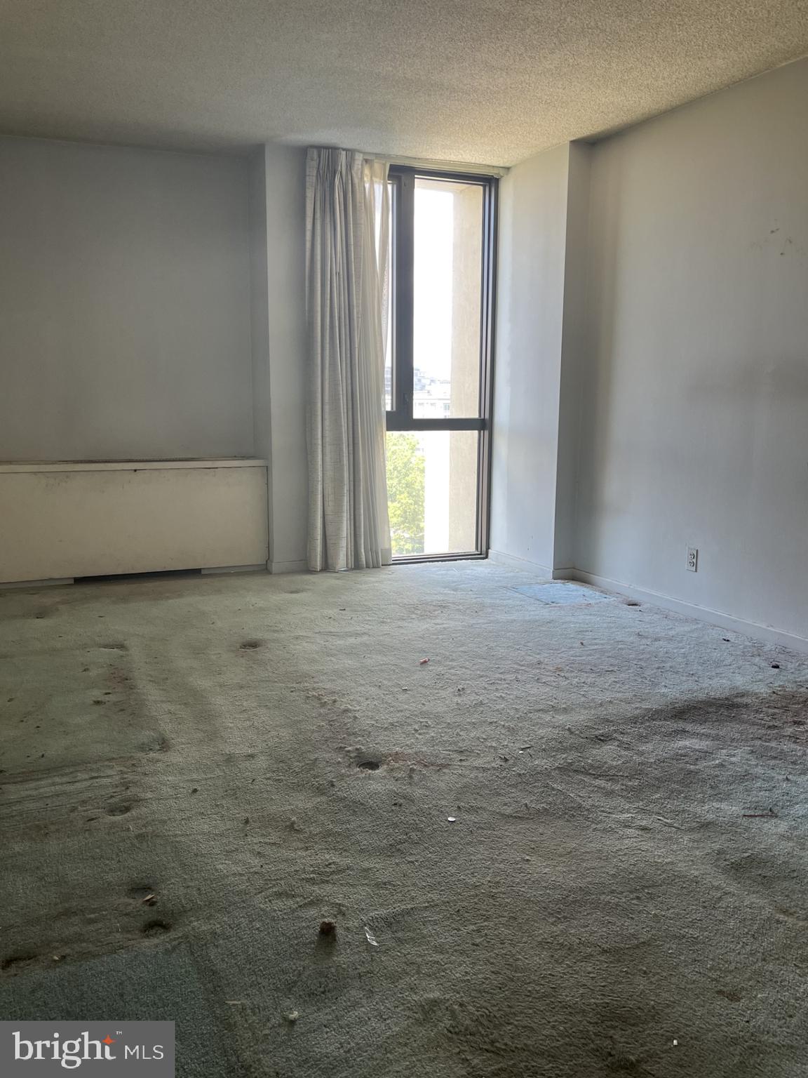 300 M Street Southwest, Unit N801 Washington, DC 20024 - Photo 8 of 12 a view of an empty room with a window