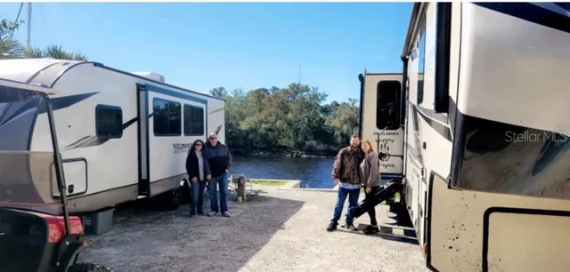 a view of a back yard of the house