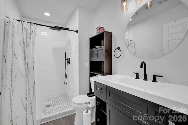 a house view with swimming pool in front of house