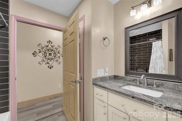 a view of yard with large trees