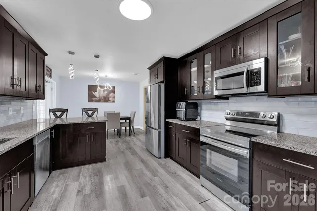 a view of a dining room with furniture