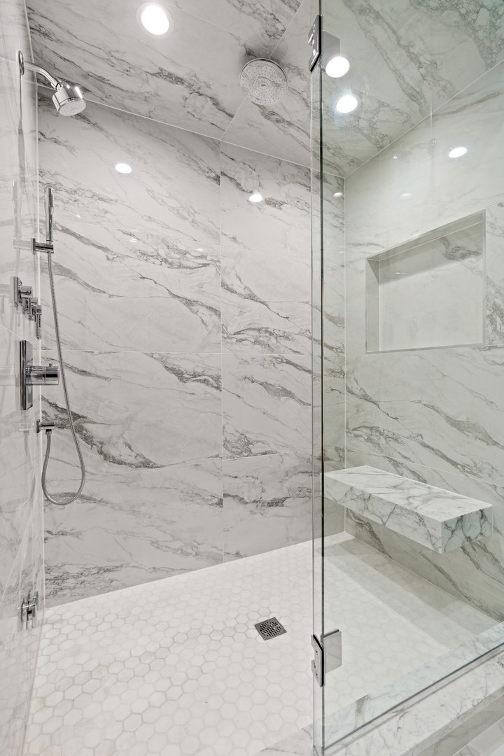 236 South Green Street, Unit 2S Chicago, IL 60607 - Photo 12 of 15 a bathroom with a shower